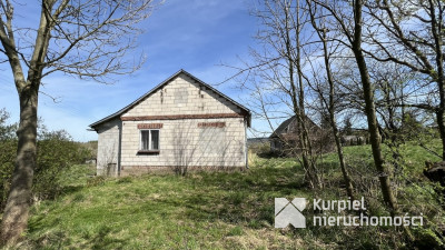 Nieduży dom na wzgórzu w Kramarzówce